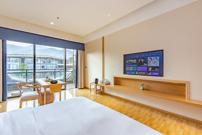 Imagen de la habitación del Hotel Emei Van Stars Mountain Lodge. Foto 10