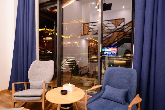 Imagen de la habitación del Hotel Emei Van Stars Mountain Lodge. Foto 12