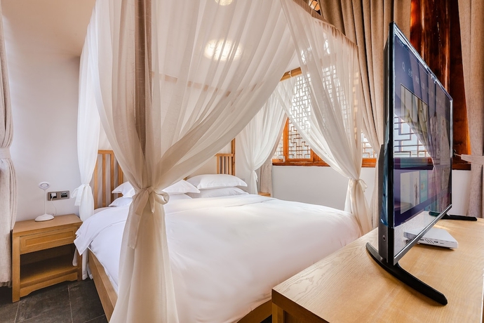 Imagen de la habitación del Hotel Emei Van Stars Mountain Lodge. Foto 13