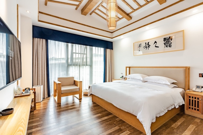 Imagen de la habitación del Hotel Emei Van Stars Mountain Lodge. Foto 15