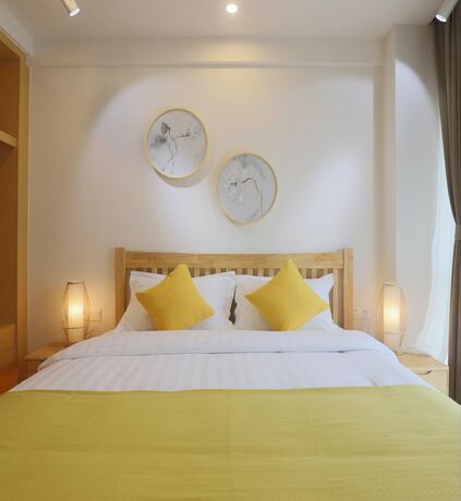 Imagen de la habitación del Hotel Emei Volume Shutang Vacation Apartment. Foto 14