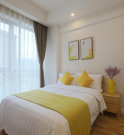 Imagen de la habitación del Hotel Emei Volume Shutang Vacation Apartment. Foto 16