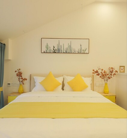 Imagen de la habitación del Hotel Emei Volume Shutang Vacation Apartment. Foto 17