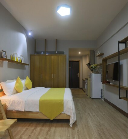 Imagen de la habitación del Hotel Emei Volume Shutang Vacation Apartment. Foto 18