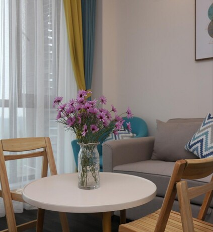 Imagen de la habitación del Hotel Emei Volume Shutang Vacation Apartment. Foto 24