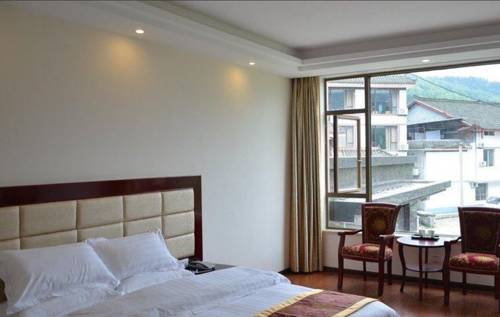 Imagen de la habitación del Hotel Emeishan Donghui Grand Hotel. Foto 5