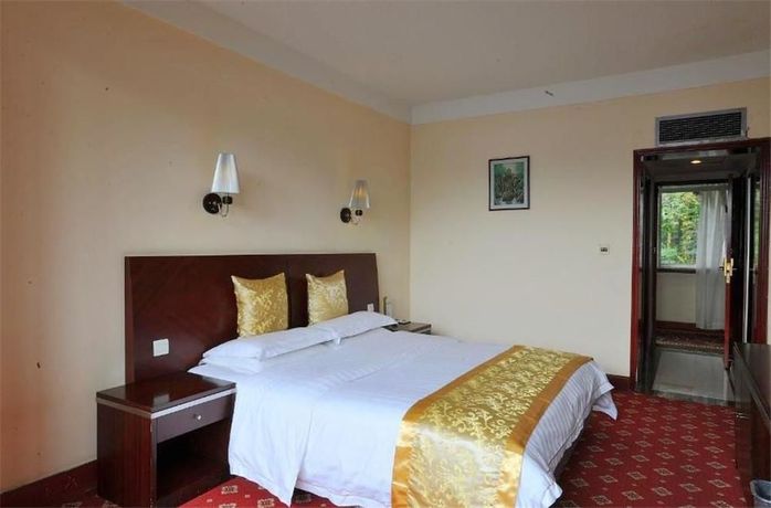 Imagen de la habitación del Hotel Emeishan Grand. Foto 4