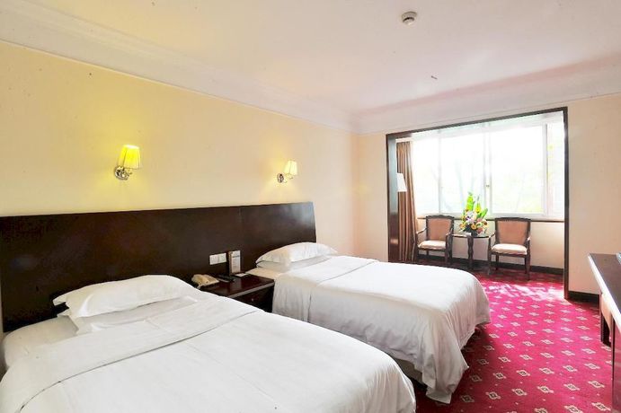 Imagen de la habitación del Hotel Emeishan Grand. Foto 8