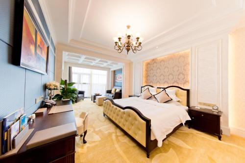 Imagen de la habitación del Hotel Emeishan Heng Mai. Foto 8