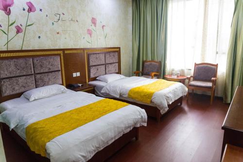 Imagen de la habitación del Hotel Emeishan Hongzhao. Foto 5