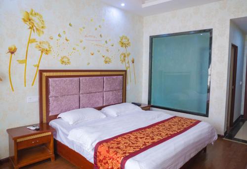 Imagen de la habitación del Hotel Emeishan Hongzhao. Foto 6