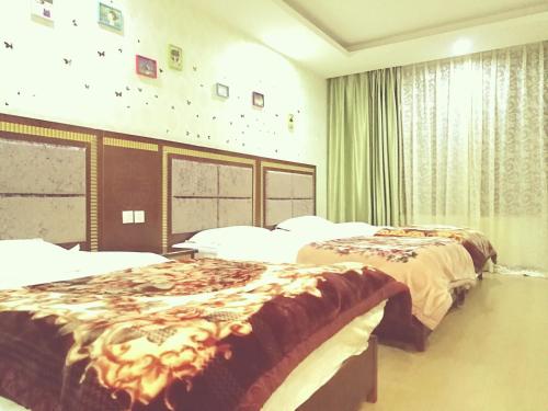 Imagen de la habitación del Hotel Emeishan Hongzhao. Foto 7