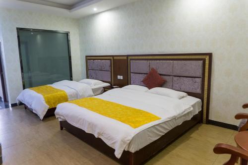 Imagen de la habitación del Hotel Emeishan Hongzhao. Foto 8