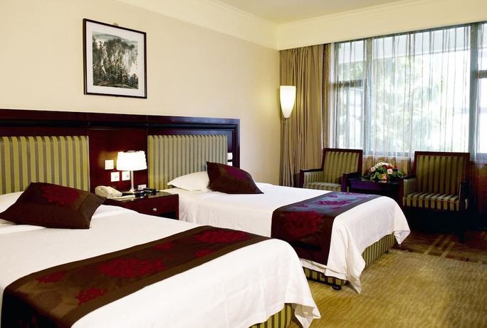 Imagen de la habitación del Hotel Emeishan Huasheng Hotel. Foto 2