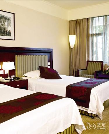 Imagen de la habitación del Hotel Emeishan Huasheng Hotel. Foto 7