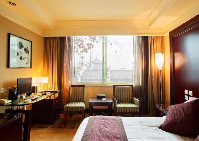 Imagen de la habitación del Hotel Emeishan Huasheng Hotel. Foto 8