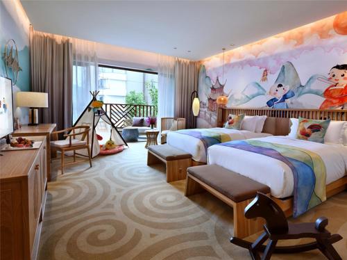 Imagen de la habitación del Hotel Emeishan Jz Woolala. Foto 8