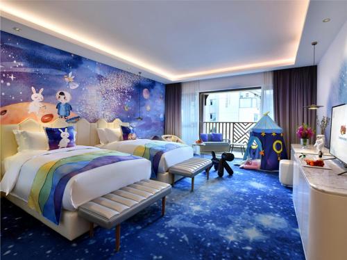 Imagen de la habitación del Hotel Emeishan Jz Woolala. Foto 9