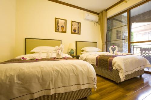 Imagen de la habitación del Hotel Emeishan Leda Hot Spring Resort. Foto 5