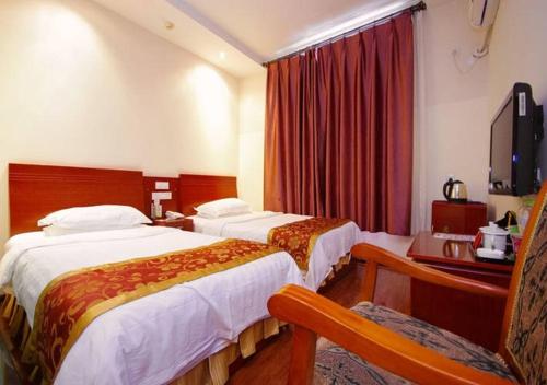 Imagen de la habitación del Hotel Emeishan Longteng Business. Foto 5