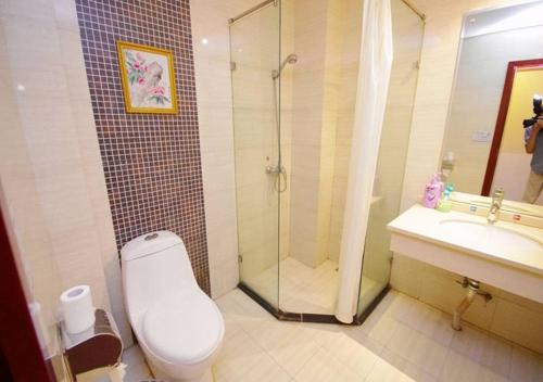 Imagen de la habitación del Hotel Emeishan Longteng Business. Foto 6