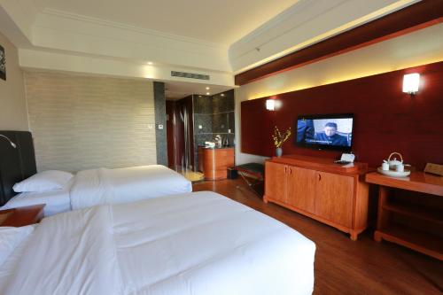 Imagen de la habitación del Hotel Emeishan Qiliping Peninsula. Foto 5