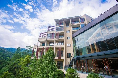 Imagen de la habitación del Hotel Emeishan Qiliping Peninsula. Foto 8