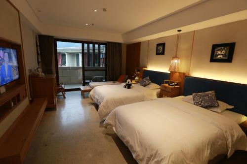 Imagen general del Hotel Emeishan Qiliping Peninsula. Foto 3