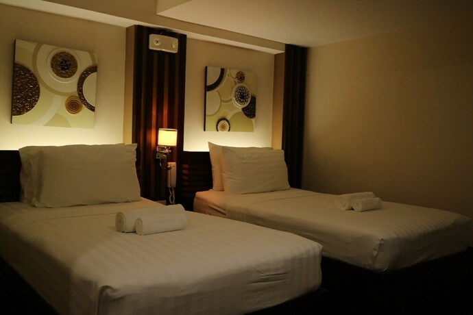 Imagen de la habitación del Hotel Emerald Boutique. Foto 13