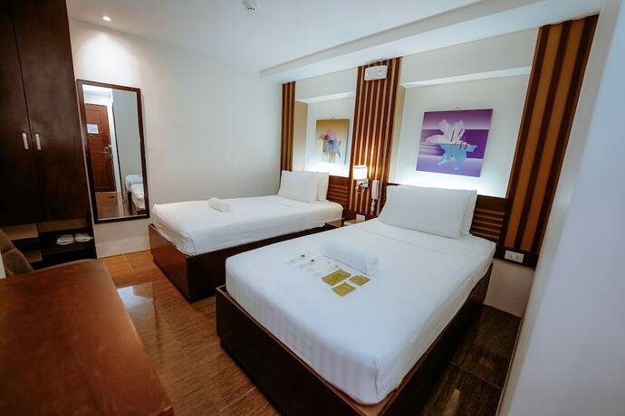 Imagen de la habitación del Hotel Emerald Boutique. Foto 14