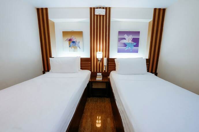 Imagen de la habitación del Hotel Emerald Boutique. Foto 15