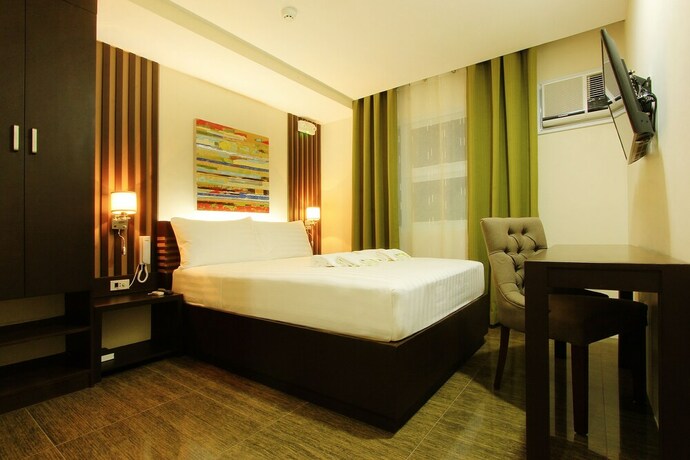 Imagen de la habitación del Hotel Emerald Boutique. Foto 18