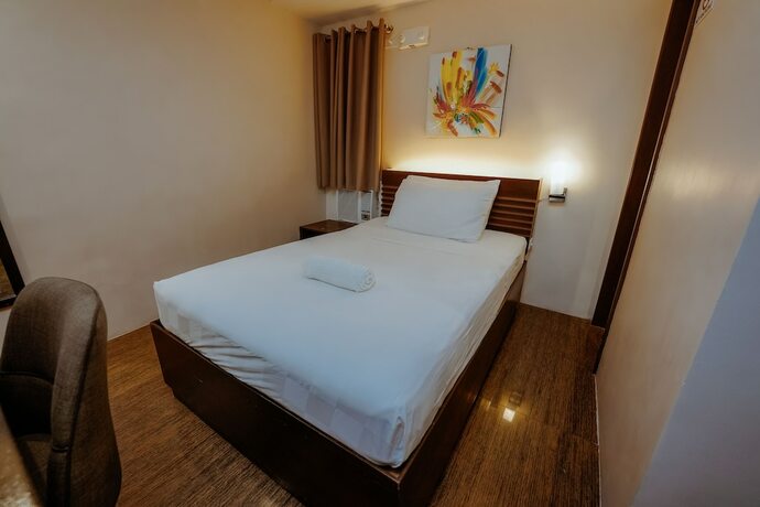 Imagen de la habitación del Hotel Emerald Boutique. Foto 19