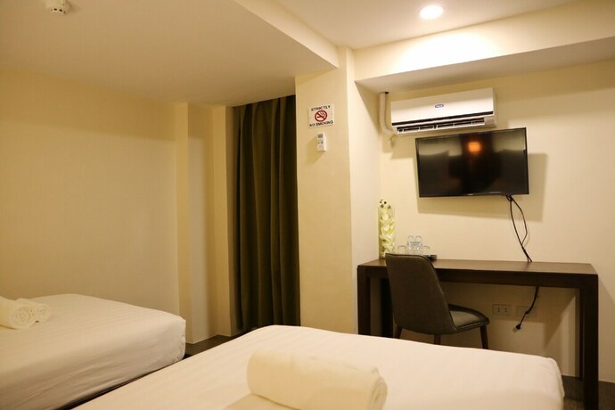 Imagen de la habitación del Hotel Emerald Boutique. Foto 24