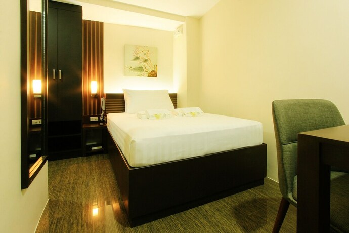 Imagen de la habitación del Hotel Emerald Boutique. Foto 26