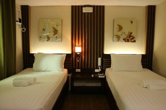 Imagen de la habitación del Hotel Emerald Boutique. Foto 28