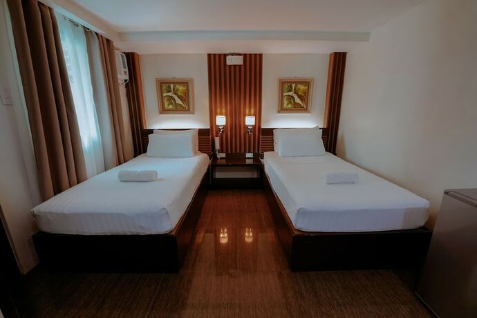 Imagen de la habitación del Hotel Emerald Boutique. Foto 29