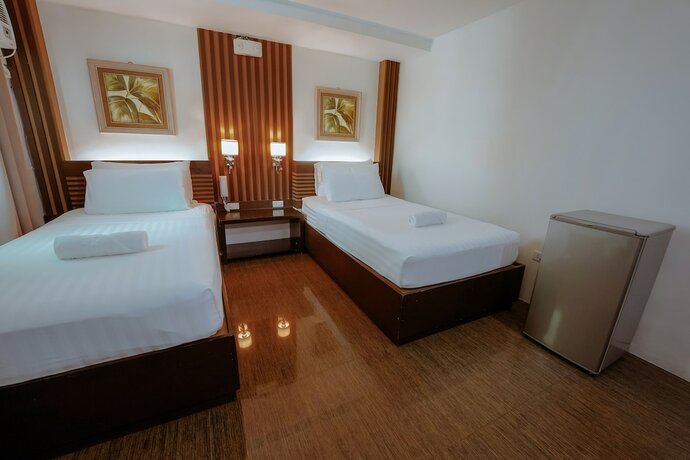 Imagen de la habitación del Hotel Emerald Boutique. Foto 30