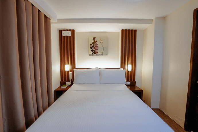 Imagen de la habitación del Hotel Emerald Boutique. Foto 32