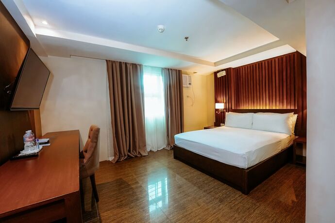 Imagen de la habitación del Hotel Emerald Boutique. Foto 36