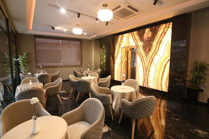 Imagen del bar/restaurante del Hotel Emerald Boutique, Tirana. Foto 2