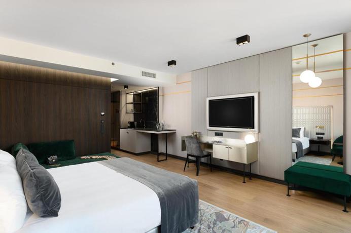 Imagen de la habitación del Hotel Emerald Downtown Suites. Foto 3