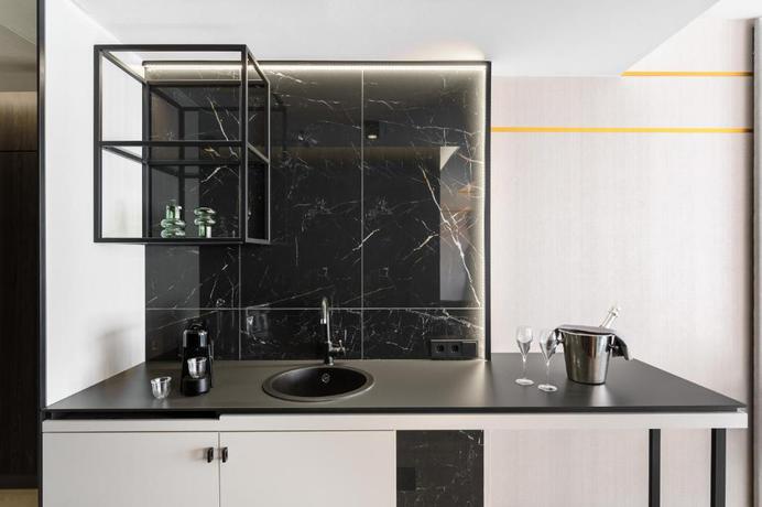 Imagen de la habitación del Hotel Emerald Downtown Suites. Foto 7