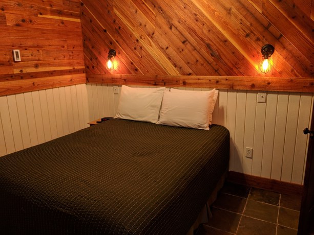 Imagen de la habitación del Hotel Emerald Forest Cabins. Foto 12