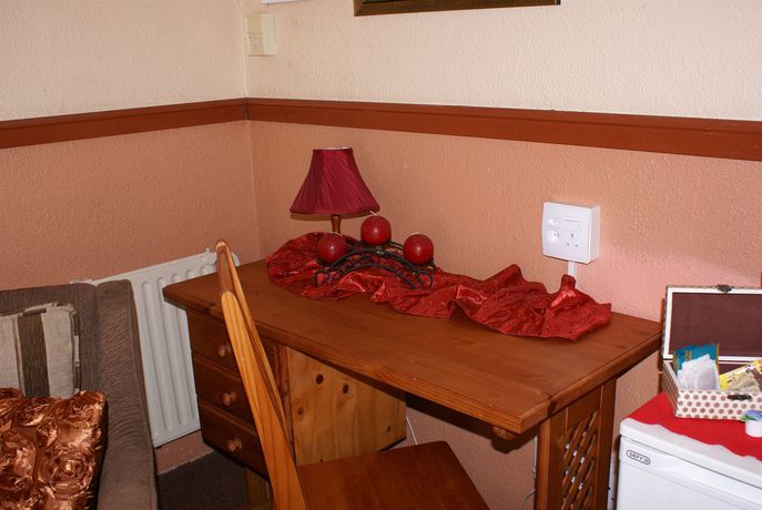 Imagen de la habitación del Hotel Emerald Guesthouse. Foto 6