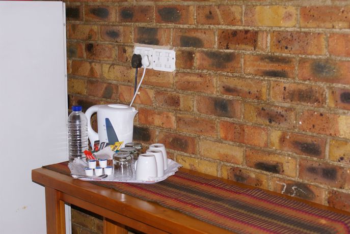 Imagen de la habitación del Hotel Emerald Guesthouse. Foto 8