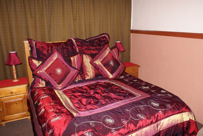 Imagen de la habitación del Hotel Emerald Guesthouse. Foto 10