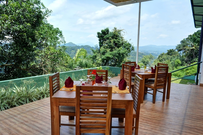 Imagen del bar/restaurante del Hotel Emerald Hill. Foto 6