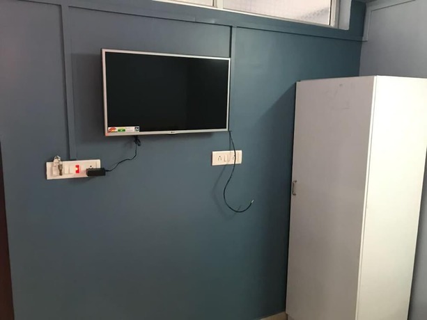 Imagen de la habitación del Hotel Emerald Homes. Foto 7