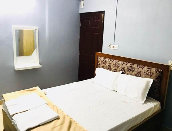 Imagen de la habitación del Hotel Emerald Homes. Foto 9